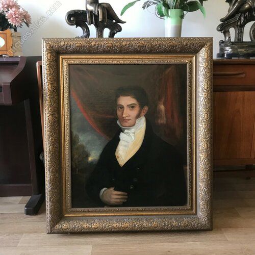 fig 2. An 18th-century oil portrait on canvas depicting a dark-haired gentleman in formal attire set within an ornate gilded frame.
