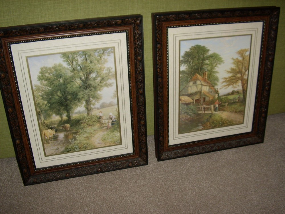 PAIR OF FINE COUNTRY PRINTS OF CATTLE WATERING & COTTAGE IN ORNATE MAHOGANY FRAMES 20 X 24 INCHES 