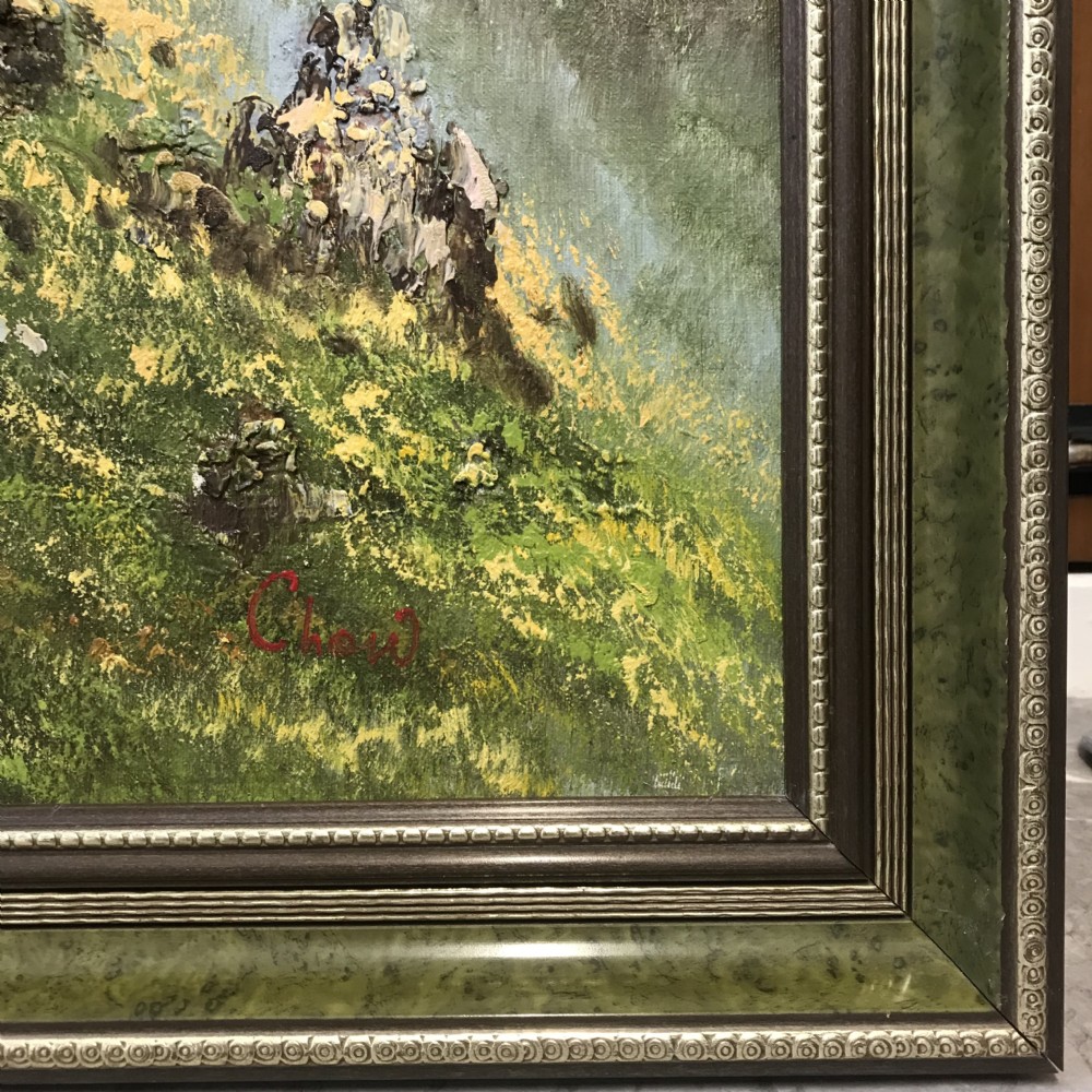 A large horizontal oil painting depicting the Great Wall of China winding through lush green mountains under a cloudy sky, encased in a metallic green and gold frame. View X