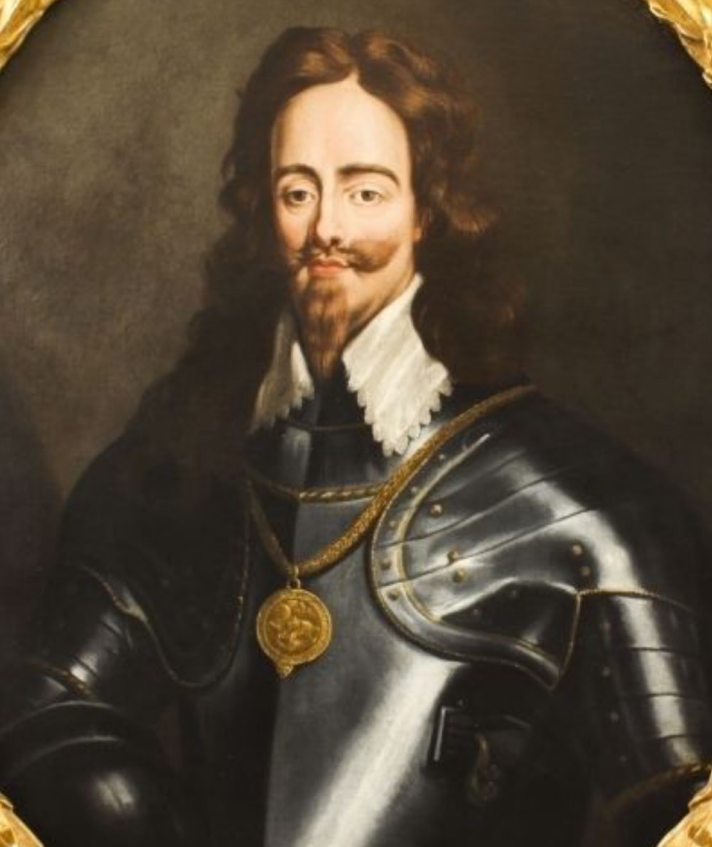 An eighteenth-century oval oil painting depicting King Charles I wearing plate armour and a lace collar within a gilded frame. View XI