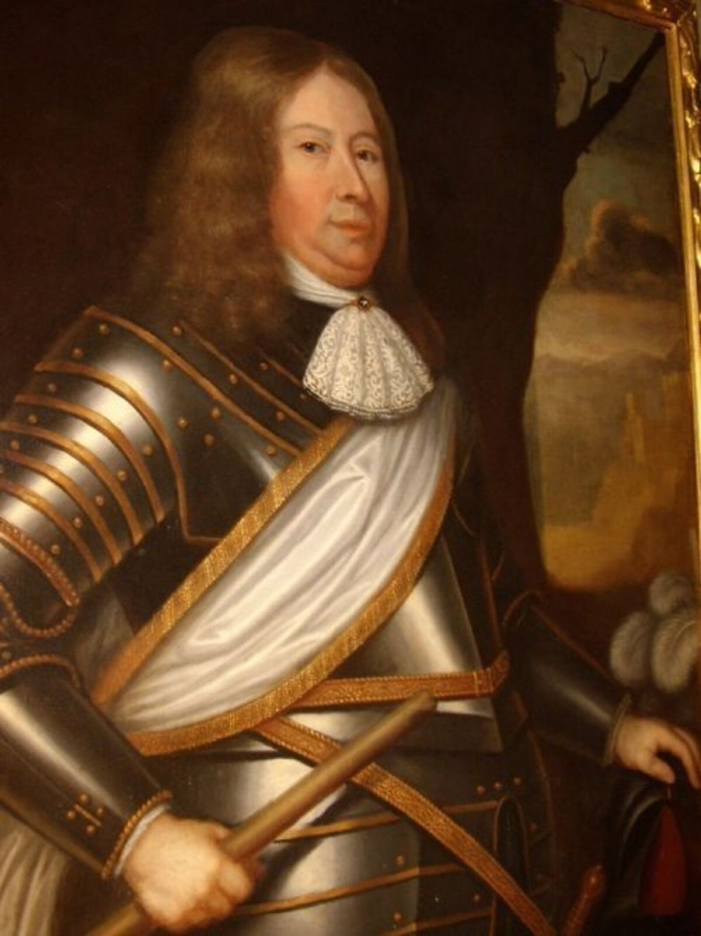A seventeenth-century oil painting portraying a gentleman in plate armour with a lace cravat, set within an ornate gilded frame. View III