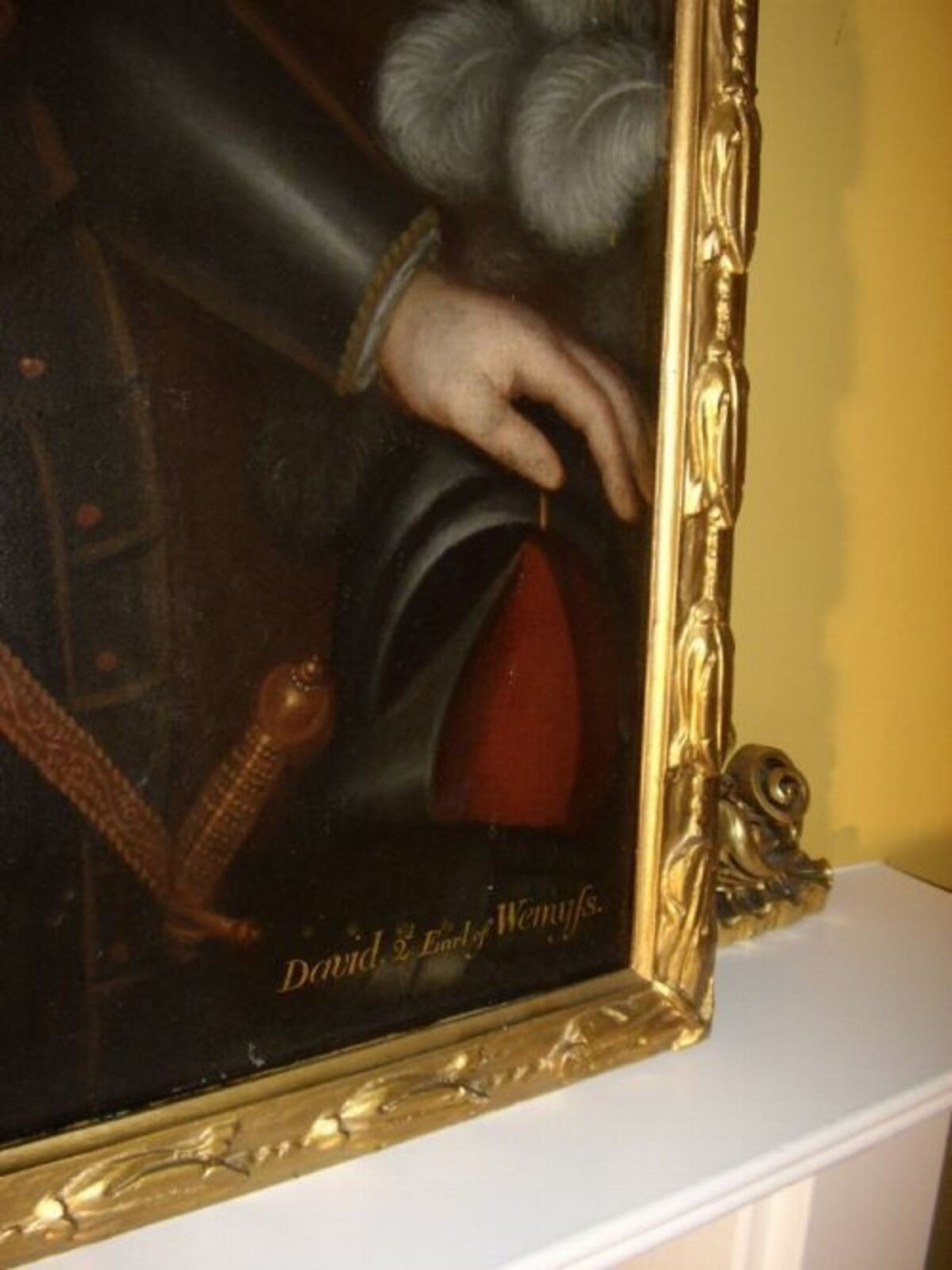 A seventeenth-century oil painting portraying a gentleman in plate armour with a lace cravat, set within an ornate gilded frame. View VI