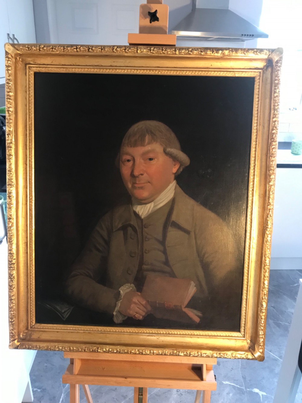 An 18th-century oil portrait depicting a male medical physician rendered in rich dark tones on canvas. View II