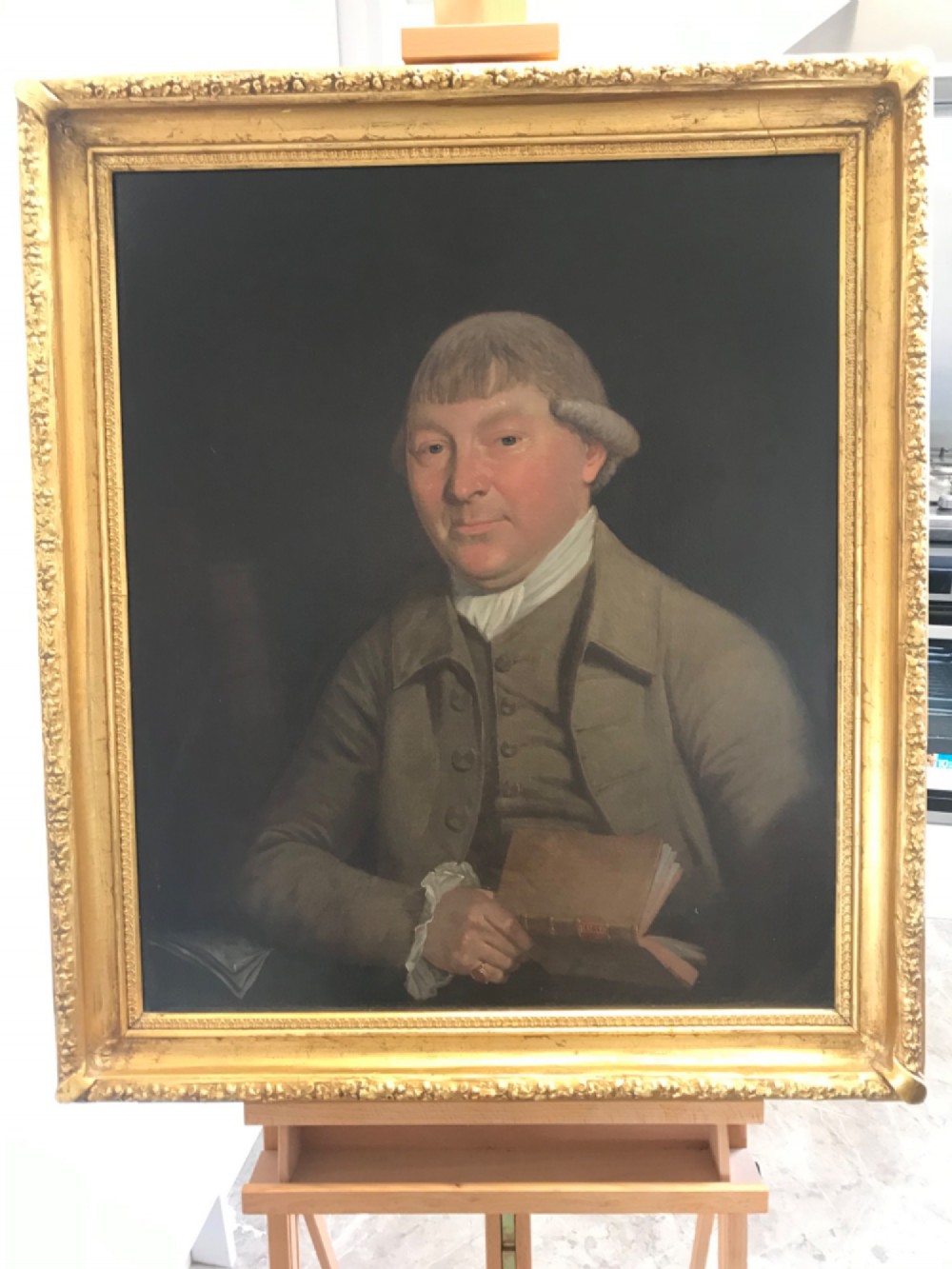An 18th-century oil portrait depicting a male medical physician rendered in rich dark tones on canvas. View III