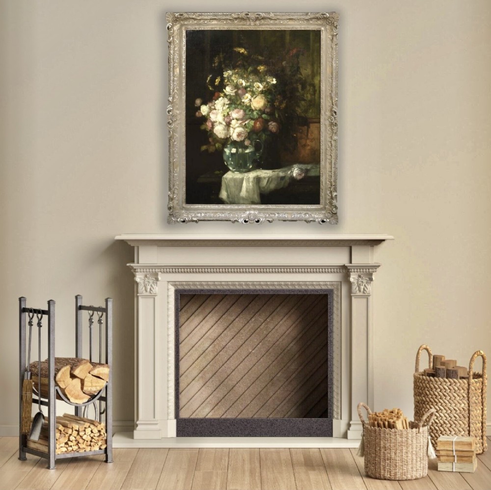 A 19th-century oil painting on canvas featuring a prominent vase of white and pink flowers on a draped tablecloth, set within an ornate silvered carved frame. View XIV