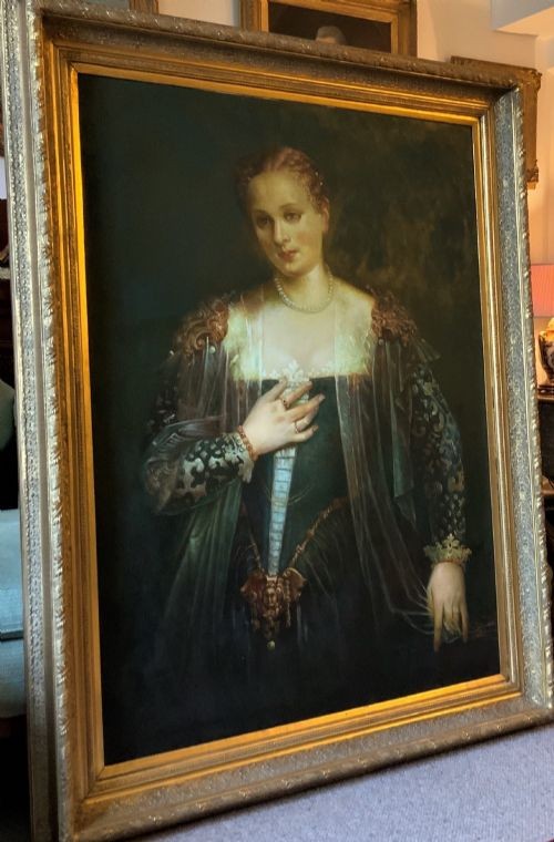 A framed oil portrait depicting a Venetian noblewoman wearing a dark gown, pearl necklace, and transparent veil, presented in a moulded gilded frame. View VIII