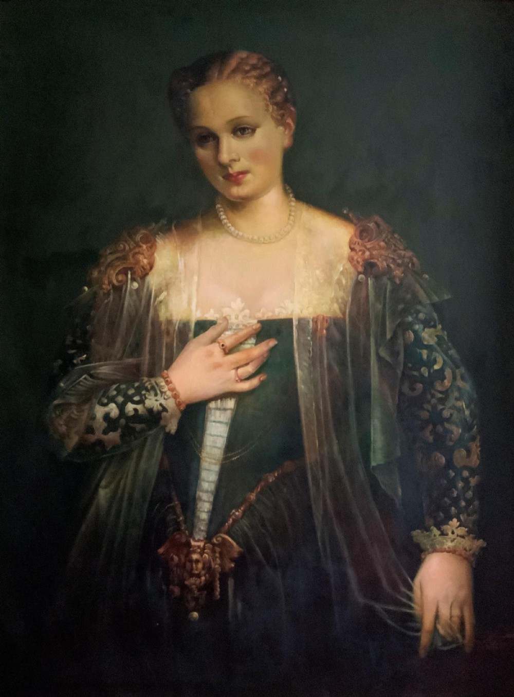 A framed oil portrait depicting a Venetian noblewoman wearing a dark gown, pearl necklace, and transparent veil, presented in a moulded gilded frame. View IX