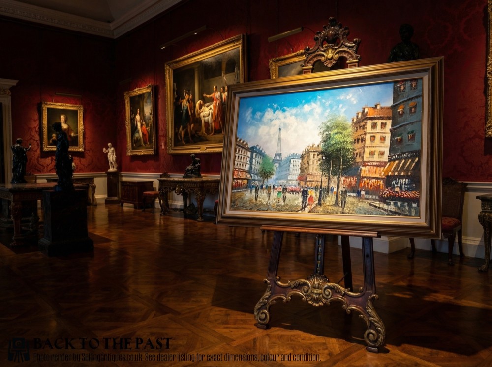 A horizontal impressionist oil painting showing a Parisian street scene with figures walking towards the Eiffel Tower, presented in a stepped gold frame. View II