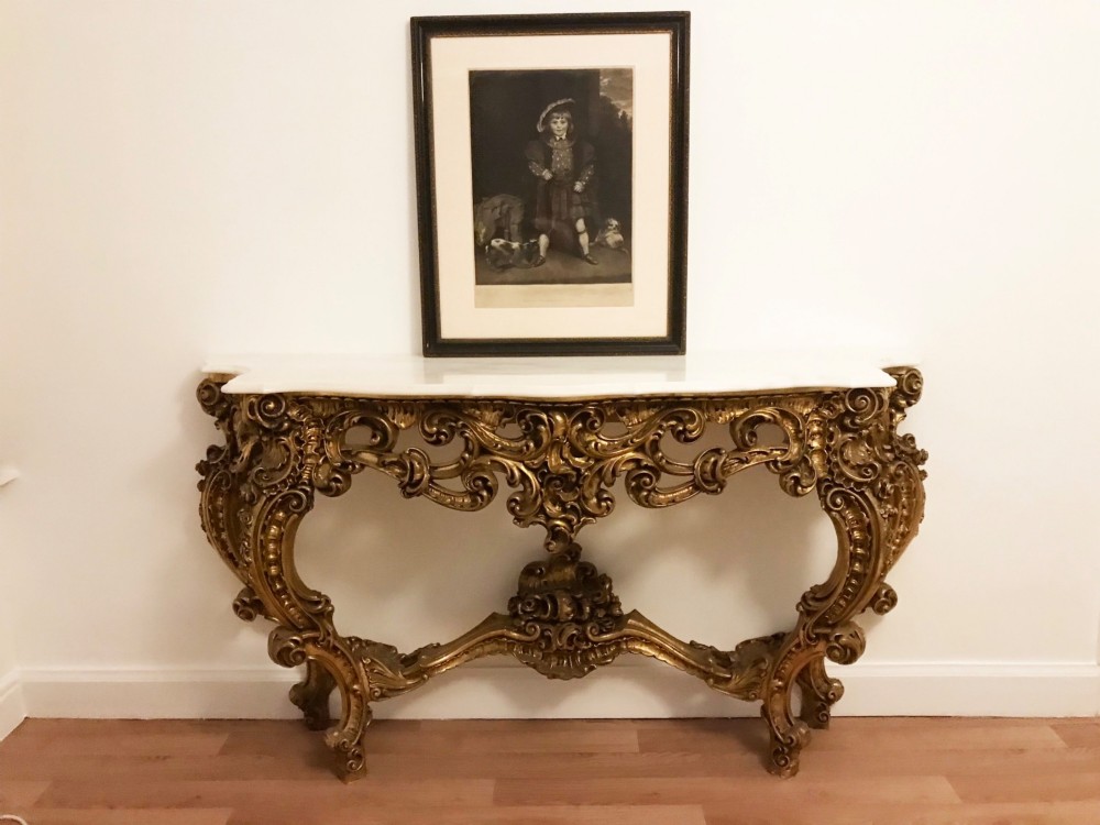 A framed black and white mezzotint print depicting a young boy in historical dress posing as Henry VIII. View II