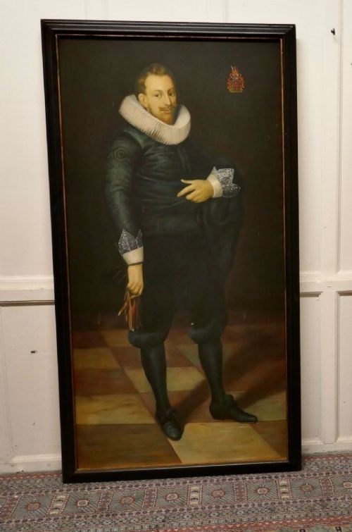 A pair of large framed full-length oil portraits depicting a man and woman in 17th-century Dutch attire with white ruff collars. View III