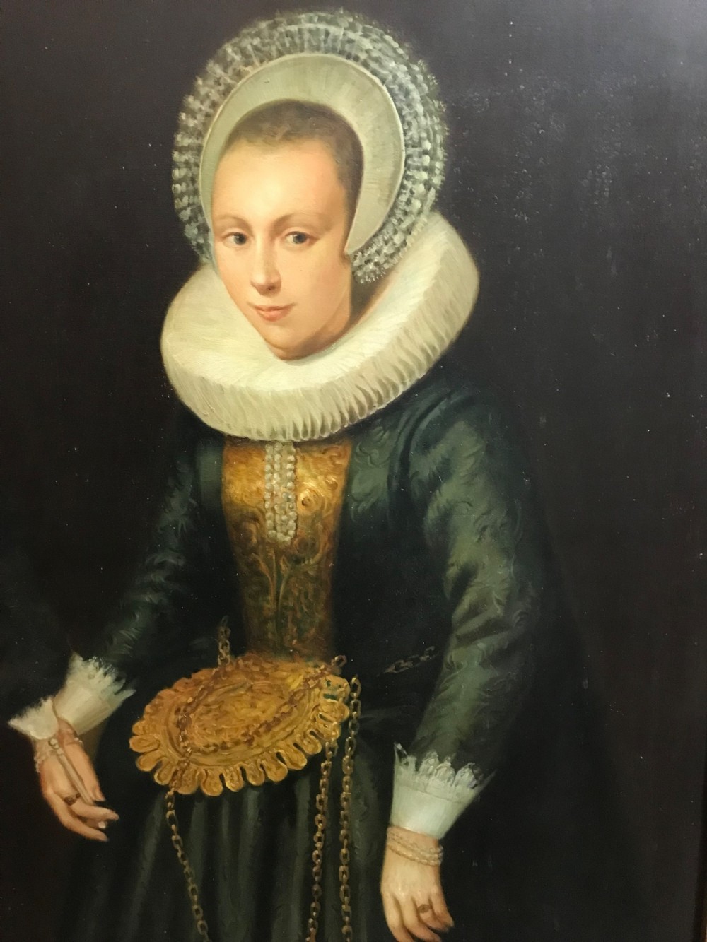 A pair of large framed full-length oil portraits depicting a man and woman in 17th-century Dutch attire with white ruff collars. View X
