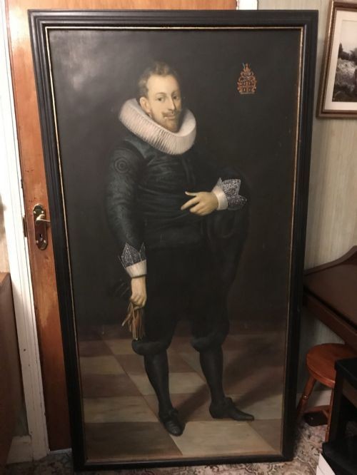 A pair of large framed full-length oil portraits depicting a man and woman in 17th-century Dutch attire with white ruff collars. View XV