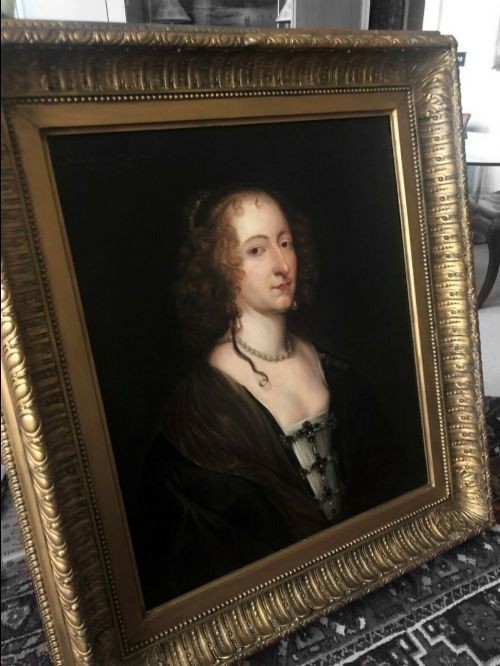 A seventeenth-century oil portrait depicting a noblewoman wearing a pearl necklace and dark drape, set within an ornate gilded frame. View III