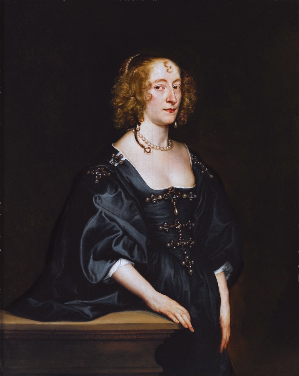 A seventeenth-century oil portrait depicting a noblewoman wearing a pearl necklace and dark drape, set within an ornate gilded frame. View X