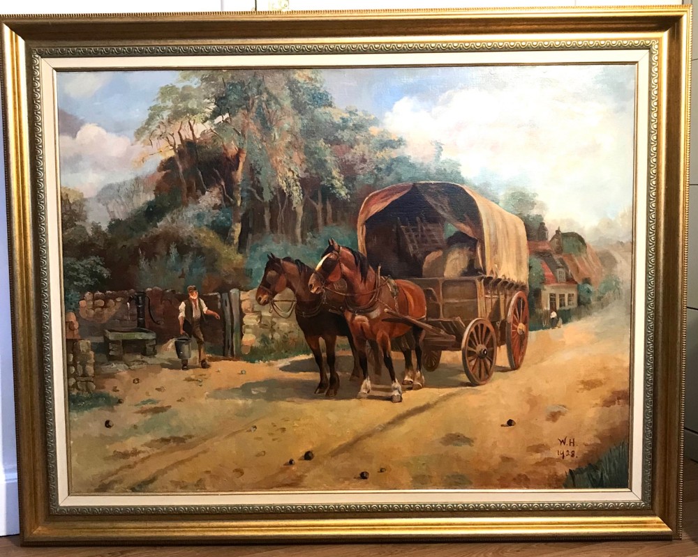 A framed oil painting depicting two brown draught horses harnessed to a covered wagon along a rural dirt road near cottages and trees. View II