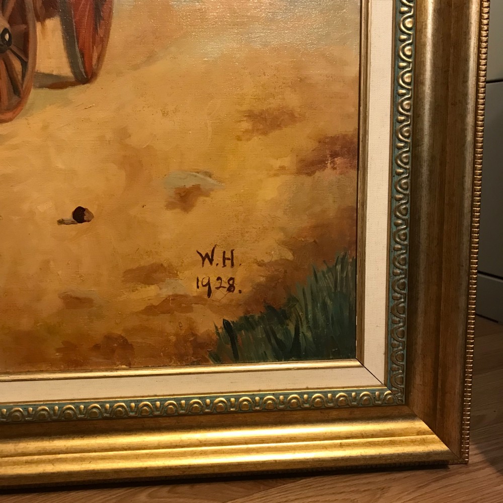 A framed oil painting depicting two brown draught horses harnessed to a covered wagon along a rural dirt road near cottages and trees. View V