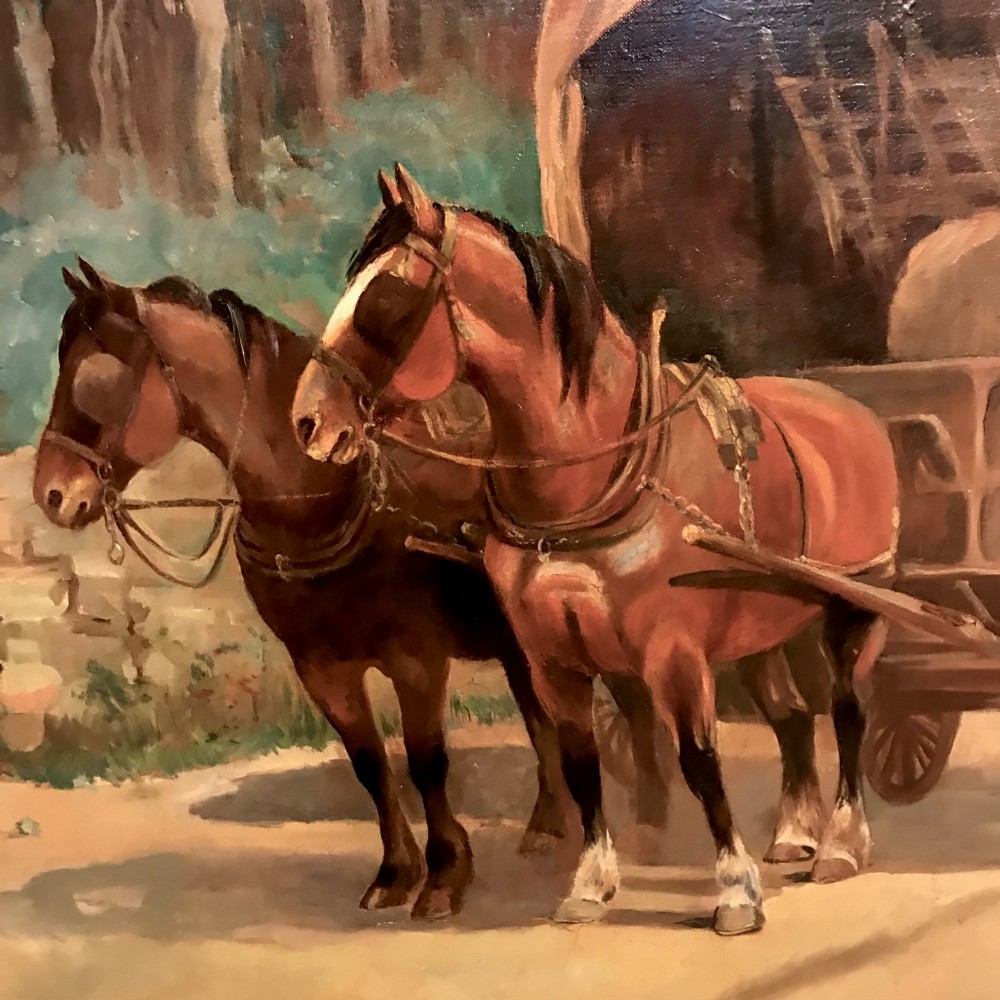 A framed oil painting depicting two brown draught horses harnessed to a covered wagon along a rural dirt road near cottages and trees. View VI