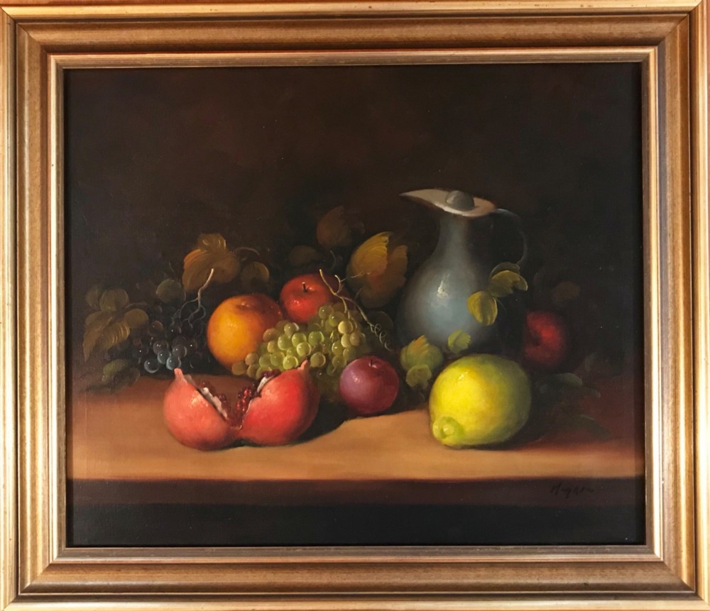 An oil painting on canvas depicting a fruit still life composition with pomegranates, grapes, apples, and a pewter jug set within a moulded gold frame. View XII