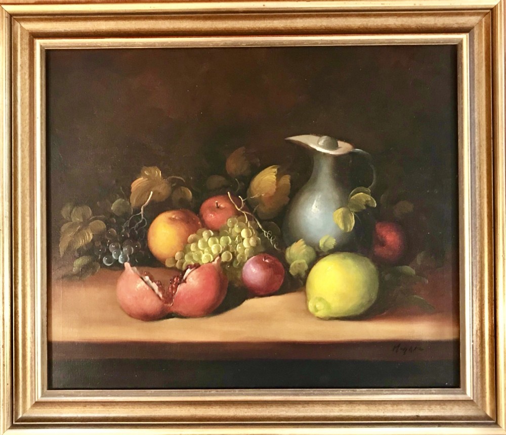 An oil painting on canvas depicting a fruit still life composition with pomegranates, grapes, apples, and a pewter jug set within a moulded gold frame. View XIII