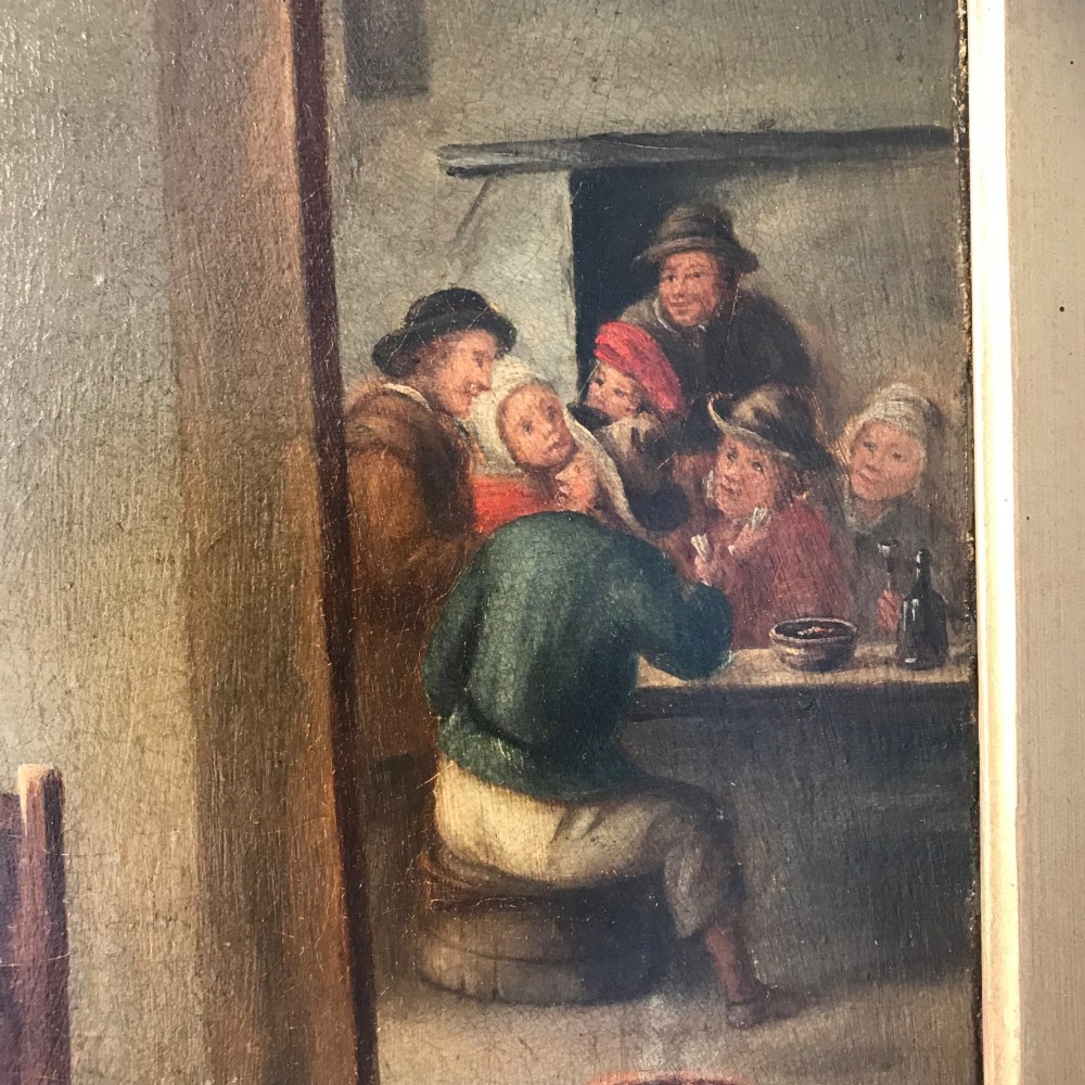 An eighteenth-century style Dutch school oil painting depicting a man and a woman seated inside a rustic tavern setting. View VI