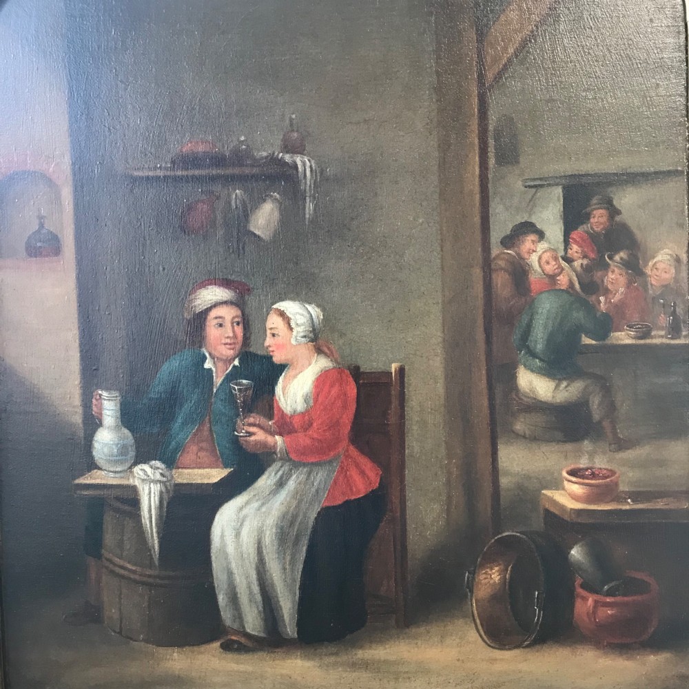 An eighteenth-century style Dutch school oil painting depicting a man and a woman seated inside a rustic tavern setting. View IX