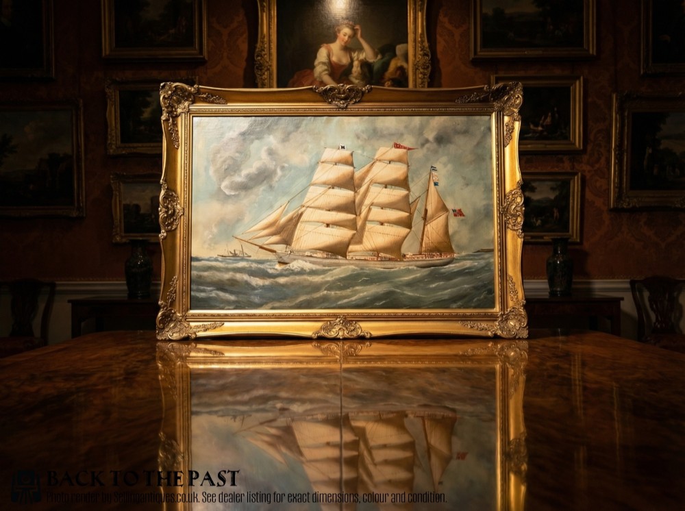 An antique oil painting depicting a three-masted wooden sailing vessel on choppy seas, set within an ornate gilt frame. View II