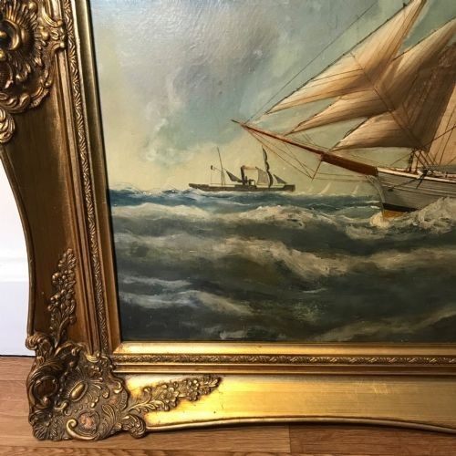 An antique oil painting depicting a three-masted wooden sailing vessel on choppy seas, set within an ornate gilt frame. View XIII