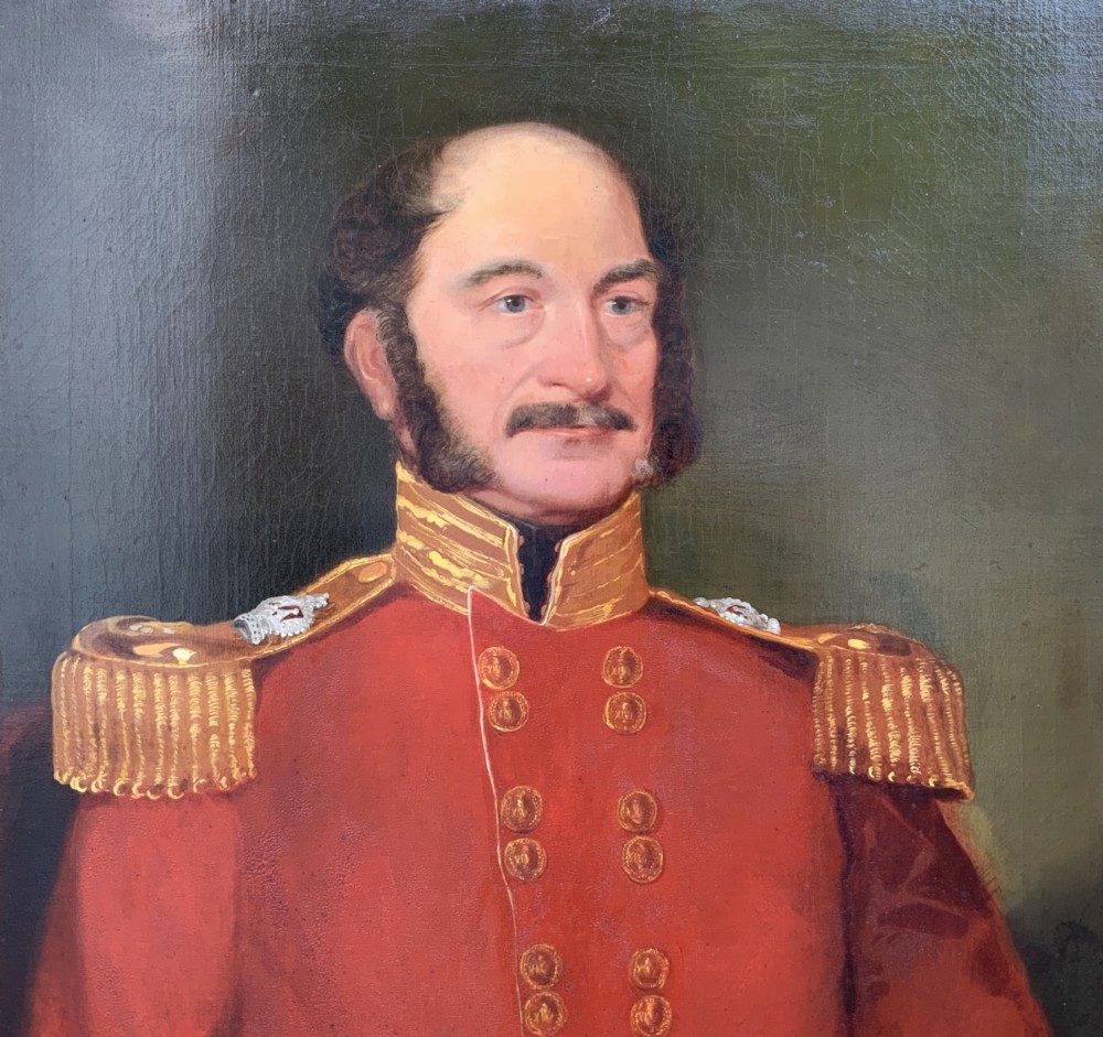 An oil portrait of a 19th-century British military officer wearing a red uniform coat with gold epaulettes, set within an ornate gilded frame. View III
