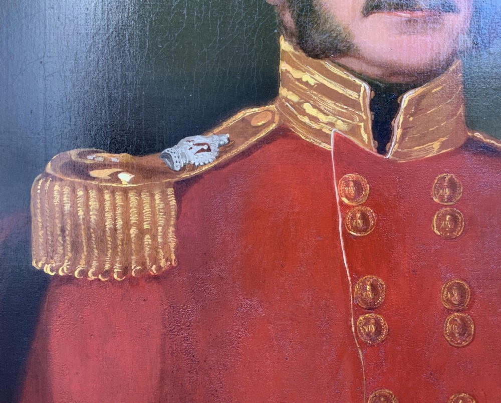 An oil portrait of a 19th-century British military officer wearing a red uniform coat with gold epaulettes, set within an ornate gilded frame. View VI