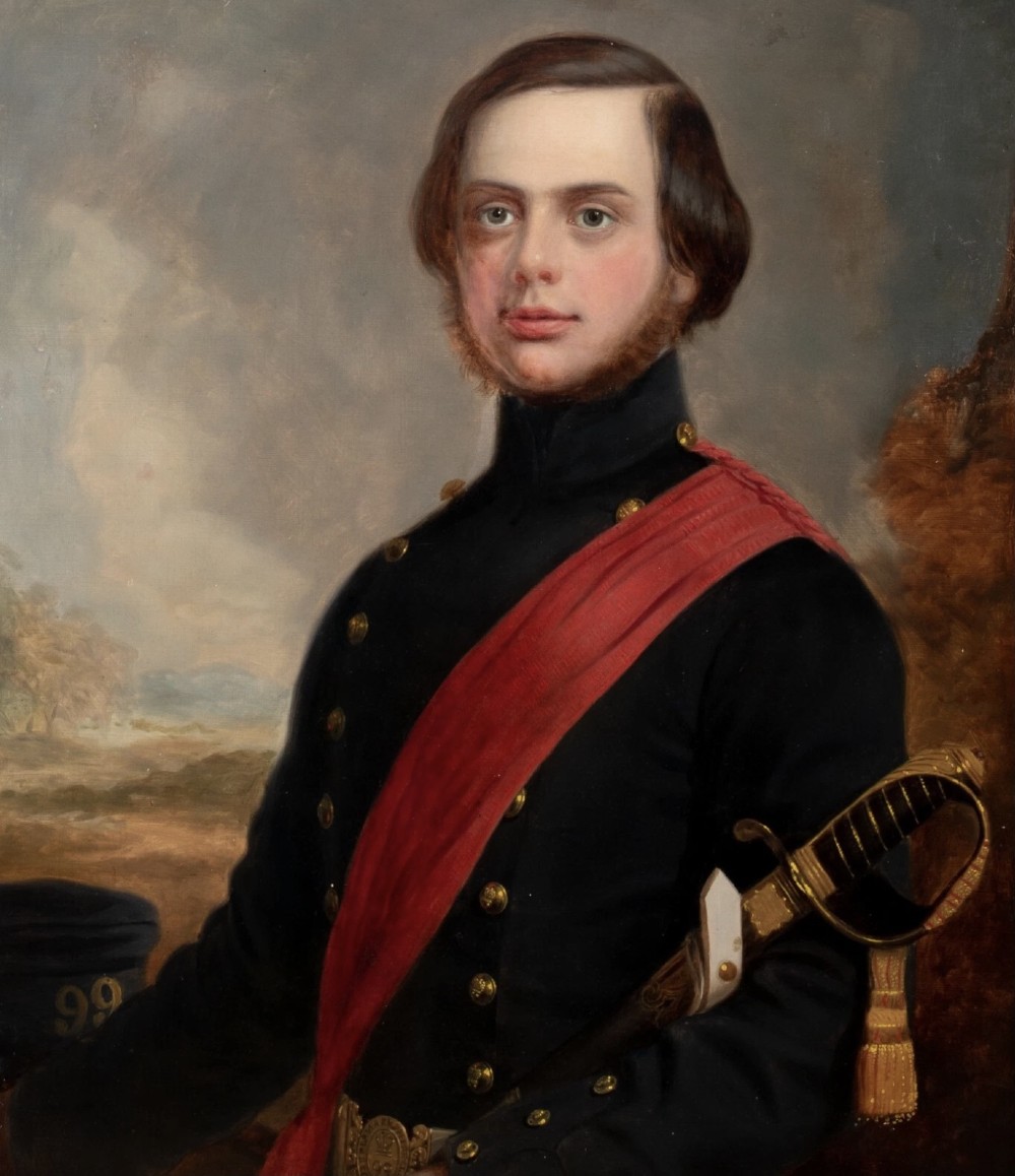 A nineteenth-century oil painting on canvas depicting a young military officer in a dark uniform with a red sash and sword, set within an ornate gilded frame. View VI