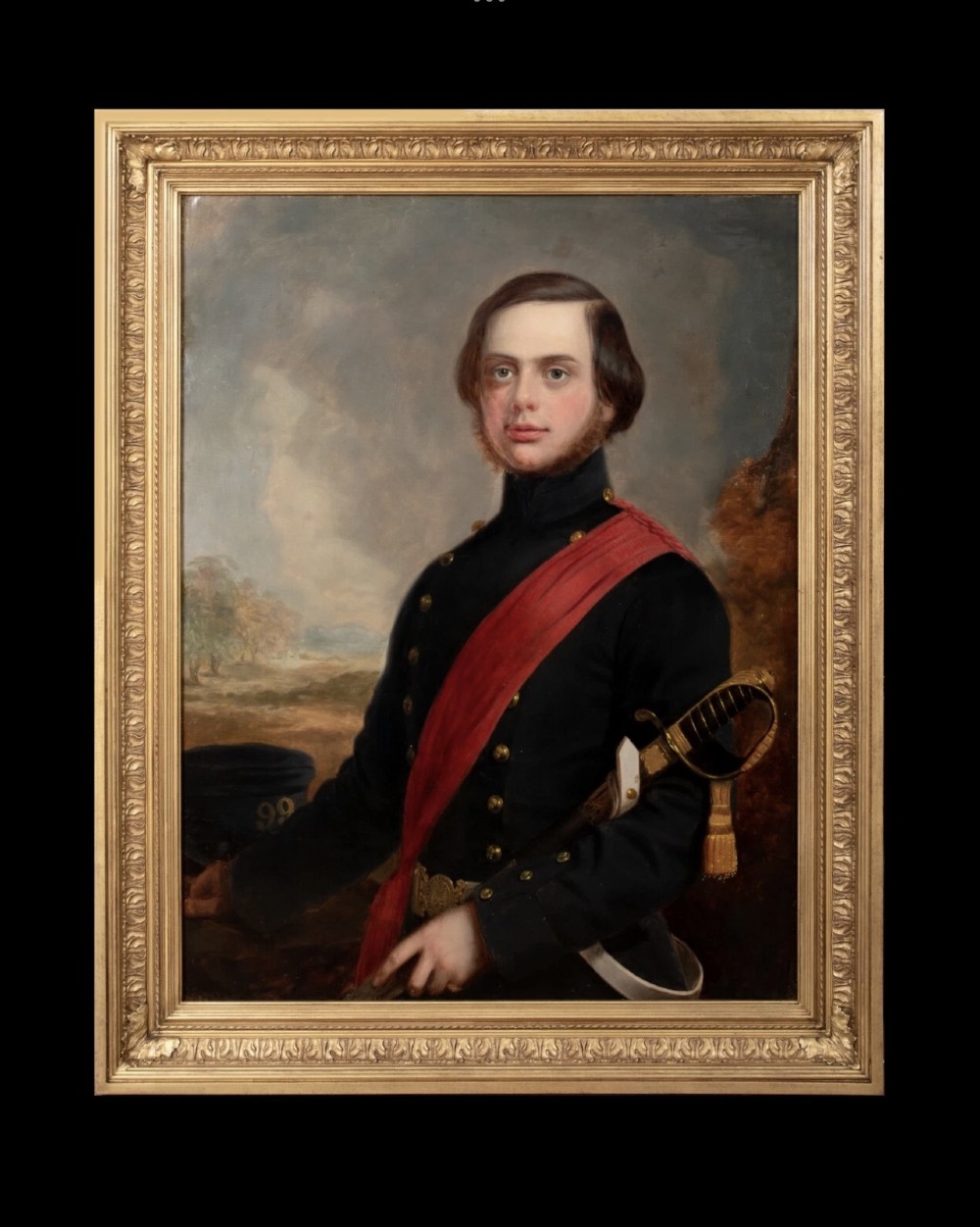 A nineteenth-century oil painting on canvas depicting a young military officer in a dark uniform with a red sash and sword, set within an ornate gilded frame. View X