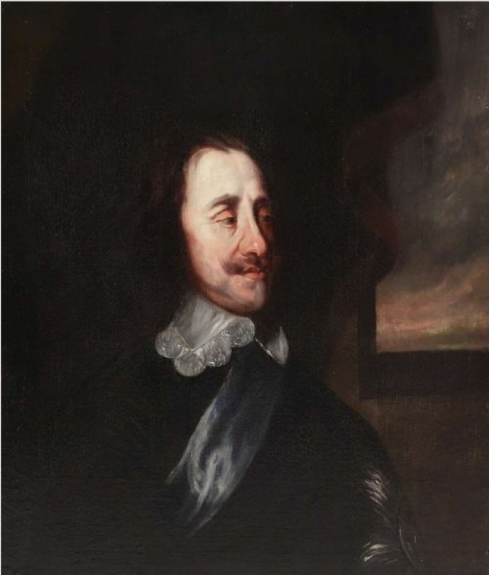 A seventeenth-century bust-length oil portrait of King Charles I presented in a carved giltwood frame. View IV
