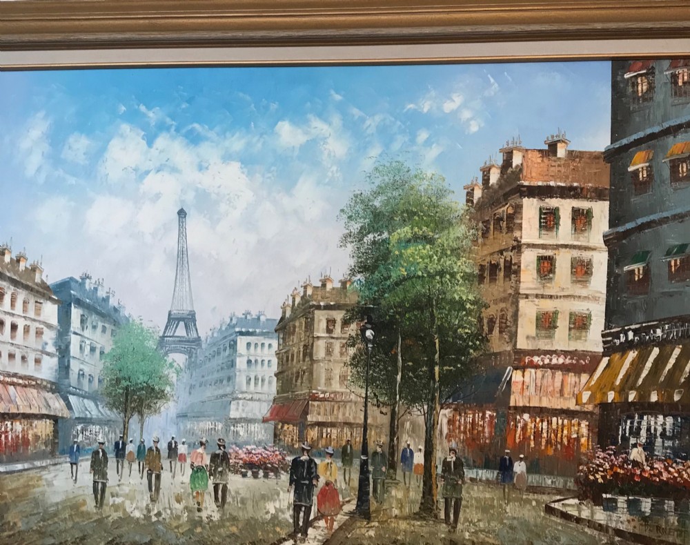 A large framed impressionist oil painting depicting a bustling Parisian street scene with buildings, figures, and the Eiffel Tower under a bright blue sky. View IX