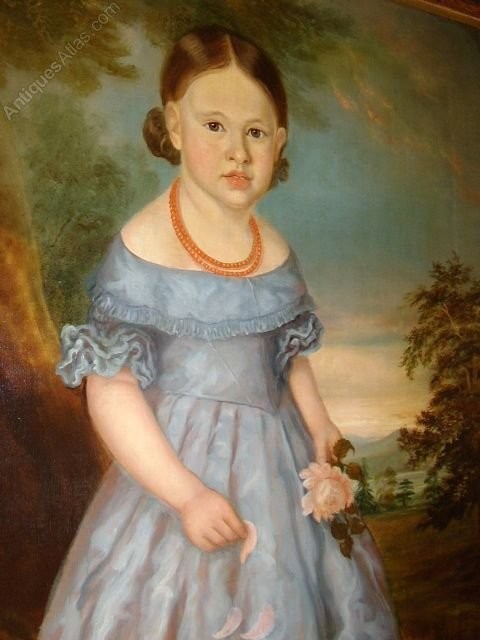 An antique oil portrait on canvas depicting a young girl in a blue dress holding a rose, displayed within a wide flame wood frame. View X