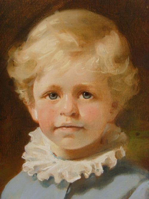 An oval 19th-century pastel portrait of a young boy with blond hair wearing a blue jacket, presented in a moulded gilt frame. View V