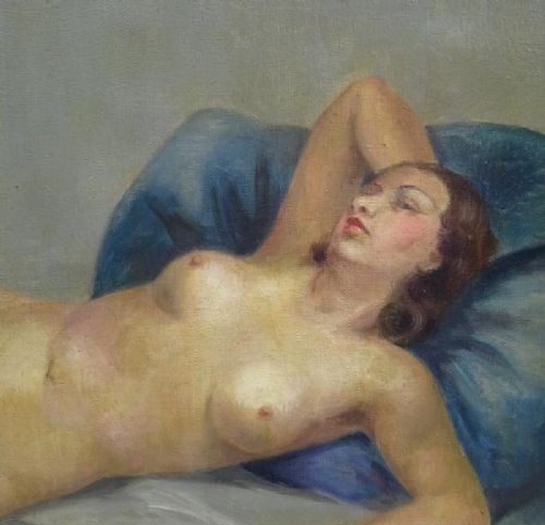 A framed French Art Deco oil painting on canvas depicting a reclining female nude resting against a blue pillow. View V
