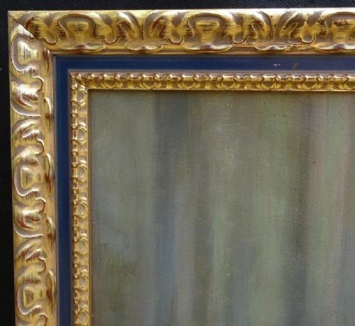 A framed French Art Deco oil painting on canvas depicting a reclining female nude resting against a blue pillow. View VII