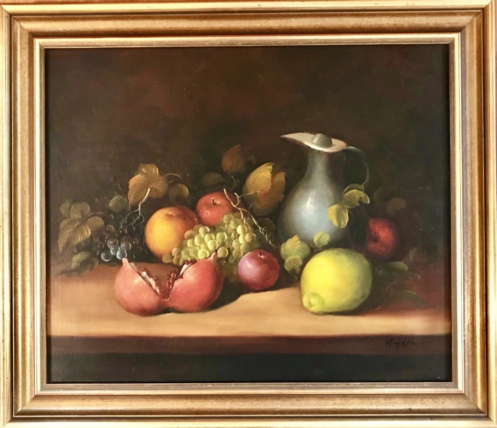A framed oil painting on canvas depicting a classical still life of pomegranates, grapes, apples, and a jug arranged on a dark table surface. View VI