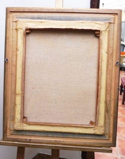 A portrait oil painting depicting a lady in a black lace mantilla set within a moulded gilt wood frame. View II