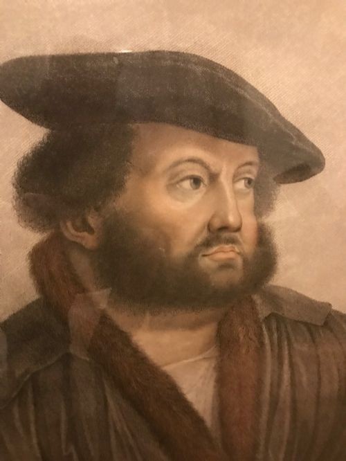 A framed late 18th-century stipple engraving portrait of Hans Holbein set within a mould-detailed dark and gilt wood frame. View V