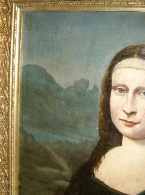 An 18th-century oil portrait painting after Leonardo da Vincis Mona Lisa depicted in a green dress and set within an ornate carved gold gilt frame. View IV