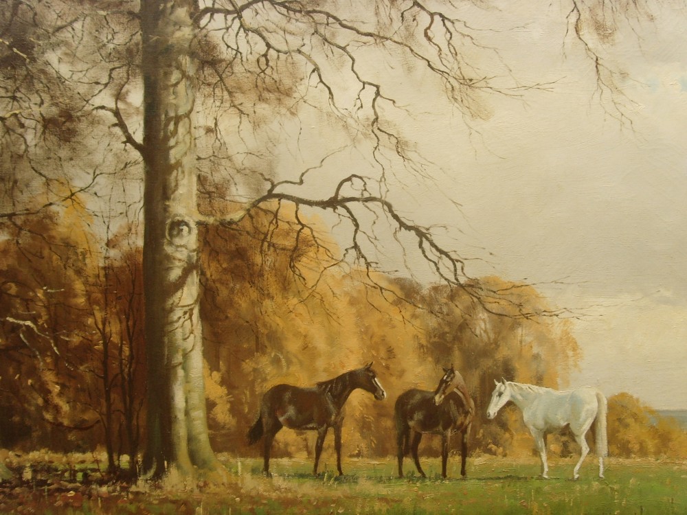 An oil painting in an ornate gilded frame depicting three horses standing in a green meadow backed by autumn trees. View III