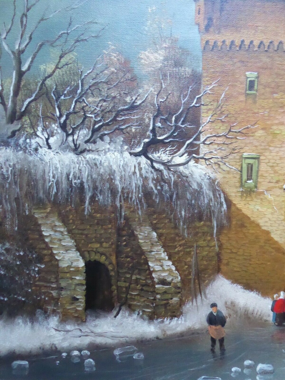 An oil painting on canvas depicting a snowy Dutch village landscape with figures, a brick tower, and bare trees, enclosed in an ornate gold gilt frame. View V