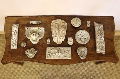 A Group of Fourteen 19th Century Plaster Architectural Mounts