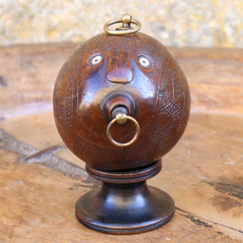 19TH CENTURY NAIVE CARVED COCONUT BUG BEAR FLASK