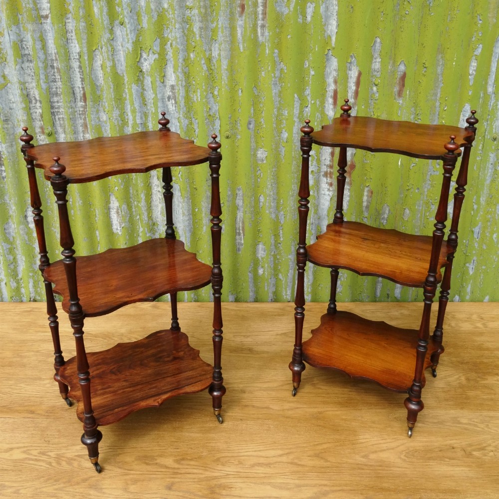 Pair of late Regency rosewood whatnots
