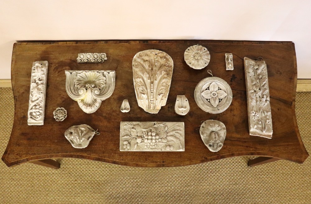 A group of fourteen 19th century plaster architectural mounts