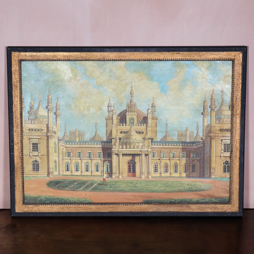 An antique oil painting depicting the Royal Pavilion in Brighton with onion domes and minarets set within a black and gold frame.