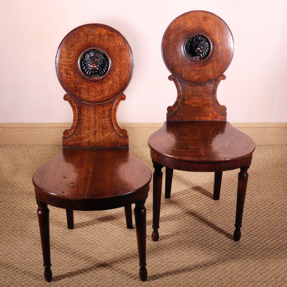 Pair of George III Oak And Lion Mask Hall Chairs