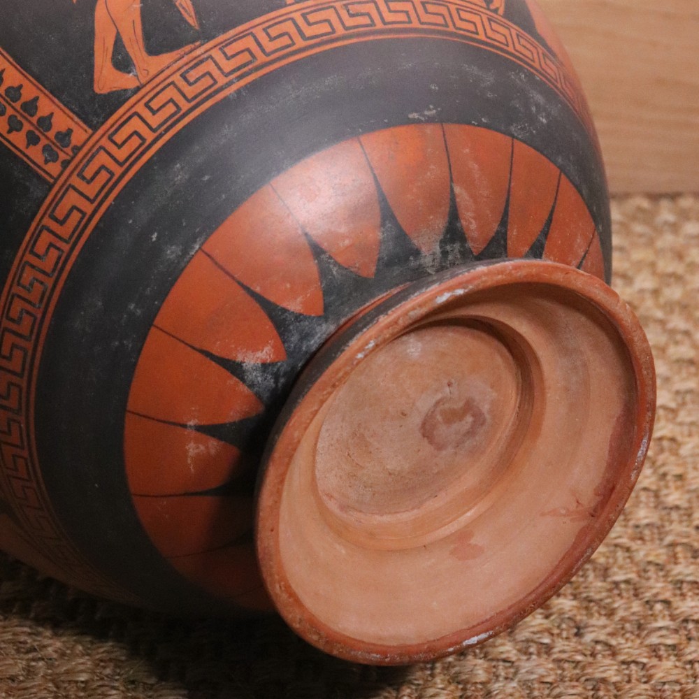 A Neoclassical terracotta column krater vase painted with black slip depicting figures from Greek mythology within geometric borders. View X